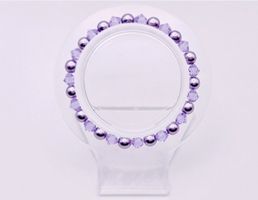 Damenarmband Perlen und Swarovski Kristalle in Lila