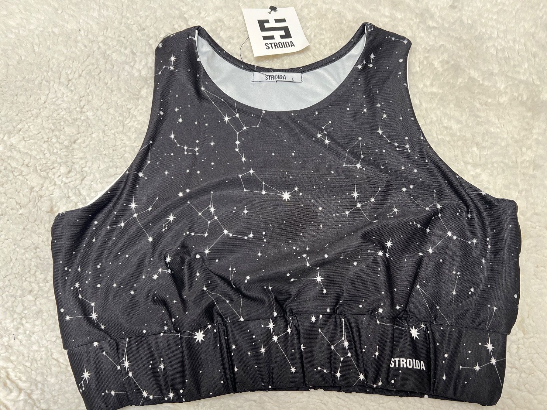 Top: Brassière de sport Stroïda, taille L, noire étoiles – Nuovo e nell'imballaggio originale da Chenens venduto da anasantos90