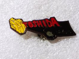 Ansteckpin 92: Toshiba