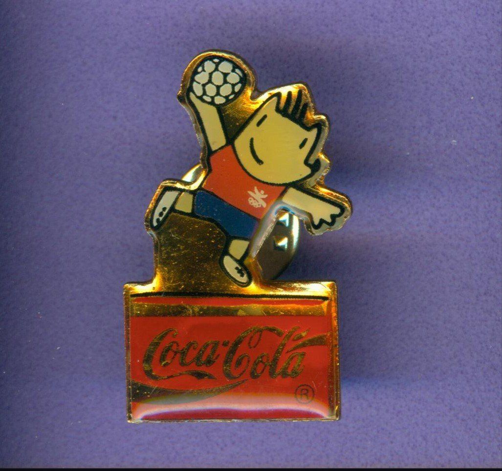Coca-Cola Plaketten & Abzeichen: Coca Cola  Barcelona '92  Maskottchen – Gebraucht aus Winterthur von Sammleroase