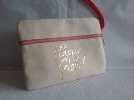 kosmetiktasche von guerlain be happy & glow