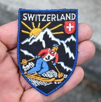 VINTAGE Badge SWITZERLAND ST. GALLER STICKEREI skifahrer