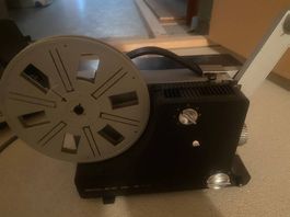 Ensemble lecteur super 8 avec bobine coupe film.