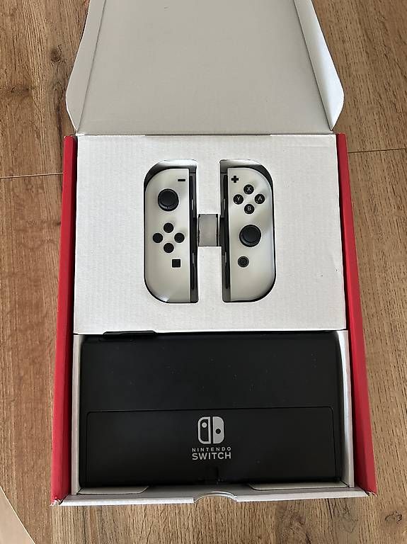 Nintendo Console: Nintendo Switch OLED Weiss, Garantie + Spiel – Nuovo (secondo la descrizione) da Arlesheim venduto da ram_lmj8 1