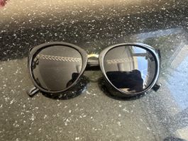 Sonnenbrille schwarz gold