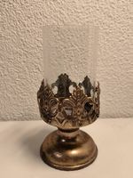 Goldenes Teelicht