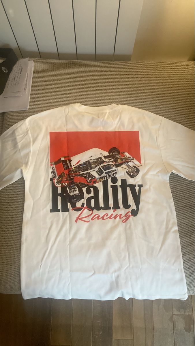 T-shirt: T-shirt Reality Racing (M) – Nuovo e nell'imballaggio originale da Neuchâtel venduto da Tradeboi
