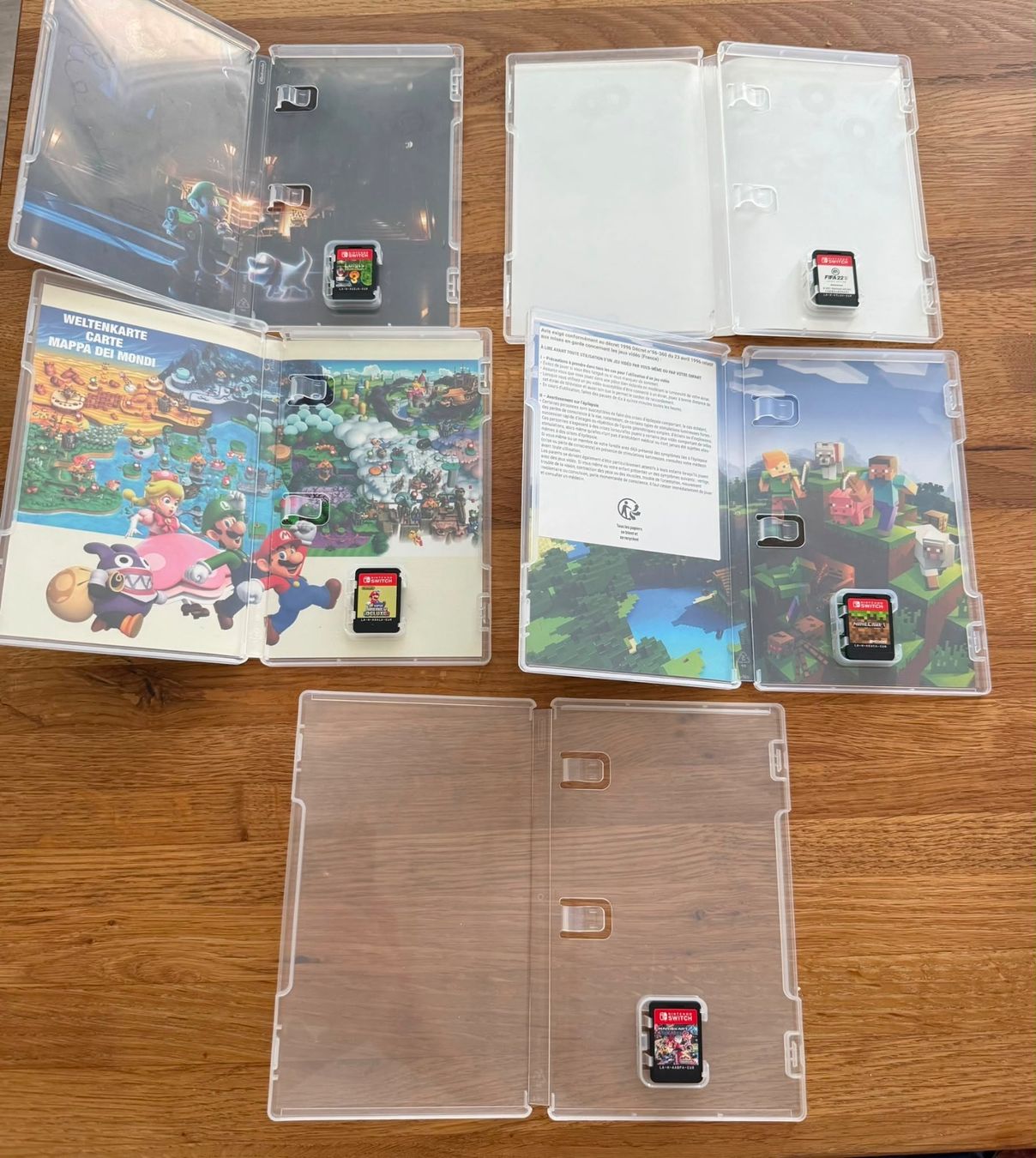 Nintendo Consoles: Nintendo Switch Bundle + Pro Controller + 5 Spiele + – D'occasion à Oberweningen par Achille.3 7