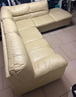 Leder-Ecksofa mit Schlaffunktion in Hellbeige