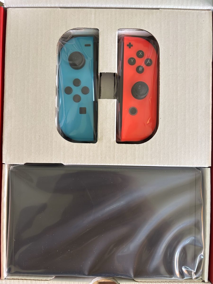 Nintendo Console: Nintendo Switch OLED Rot/Blau NEU & versiegelt + OVP + Games – Nuovo e nell'imballaggio originale da Wangen ZH venduto da cri_rnp9 2