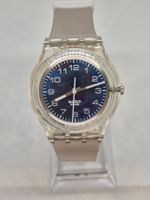 Gebrauchte Swatch-Uhr mit blauem Zifferblatt und transparent