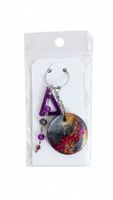 Porte-clés artisanal en résine – noir, argent et fuchsia