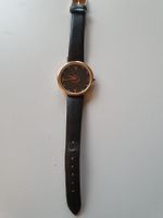 Uhr schwarz mit Kupfer