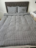 Garniture de lit consistant de 2 taie d'oreillers en plume