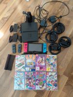 Nintendo Switch mit 8 Spielen & Zubehör