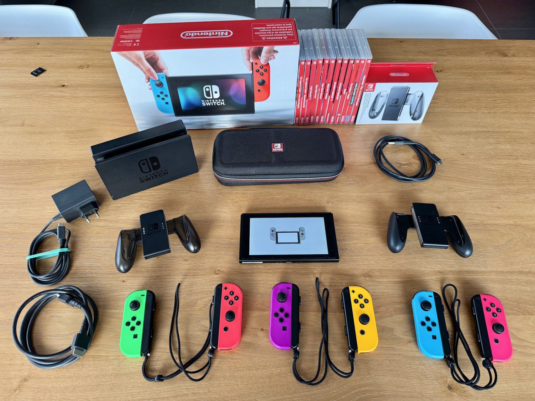 Nintendo Switch + 12 jeux + 6 Joy-Con + accessoires (Gebraucht) in ...