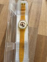 Montre Swatch squelette jaune bracelet plastique neuve