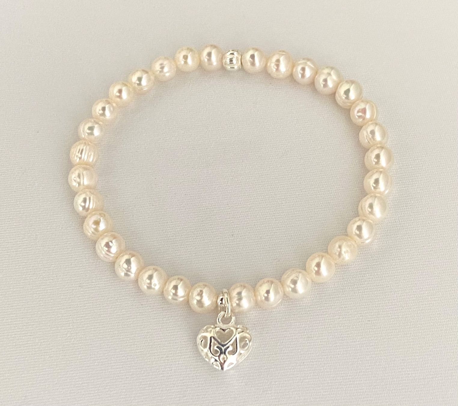 Bracciali & Braccialetti: Armband Süsswasser Perlen mit Silber auf Mass – Nuovo e nell'imballaggio originale da Zuzwil SG venduto da Lemliskat