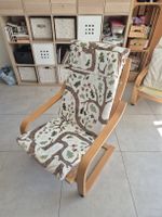 Beau fauteuil Ikea Poang noisettes