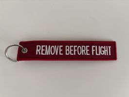 SWISS "REMOVE BEFORE FLIGHT" Schlüsselanhänger, Rot