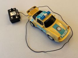 Porsche Carrera „Polizei“ Fernlenkauto  R/C Car ferngesteuer