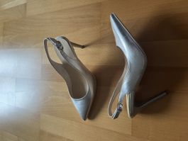 Silberne Pumps