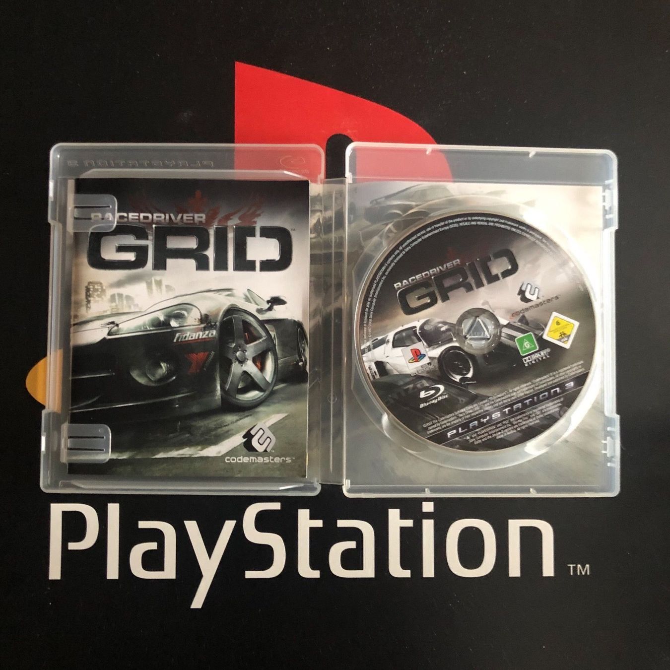 Sony Spiele: Grid für PS3 – Gebraucht aus Kestenholz von Mad18 2