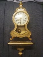 Du Chateau Wanduhr in Gold