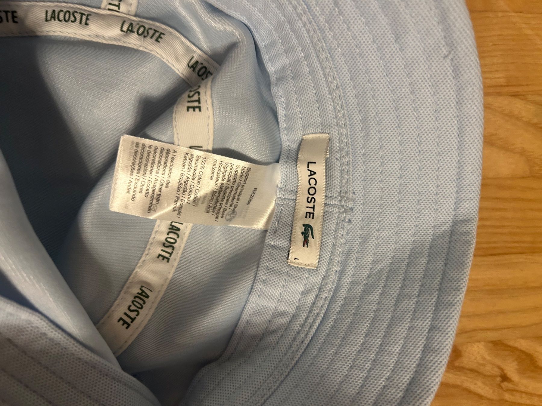 Lacoste Copricapi, berretti & cappellini: Lacoste Hut Hellblau, Top Zustand, Gr. L – Nuovo (secondo la descrizione) da Brüttisellen venduto da ThommyK 2