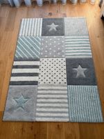 Kinderteppich grau blau Sterne