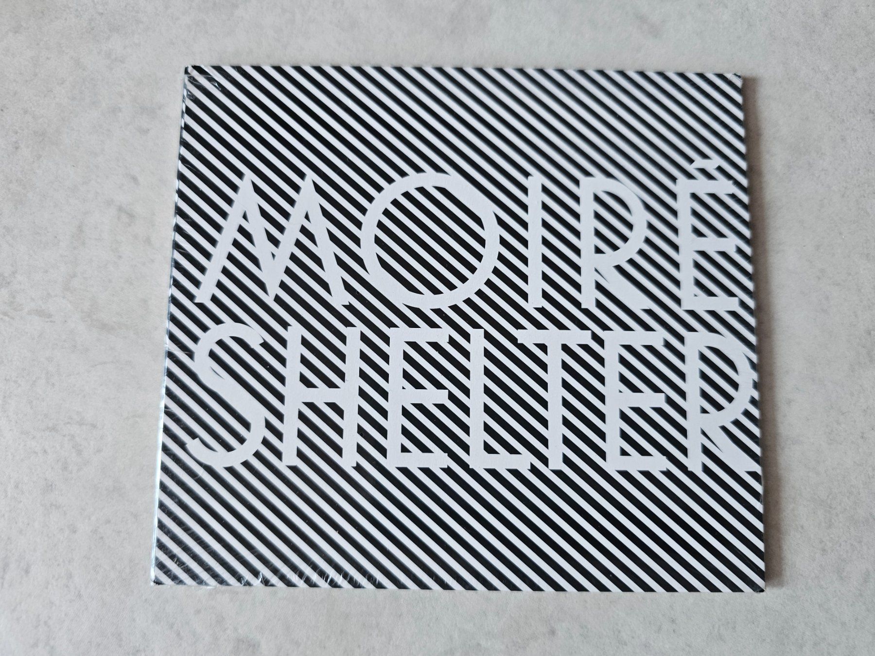 CD: Moiré  -  Shelter  /  Neuwertig – Nuovo e nell'imballaggio originale da Schneisingen venduto da backstore24