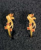 Edelstahlcreolen 18K vergoldet, mit 4 orangen Zirkonia 