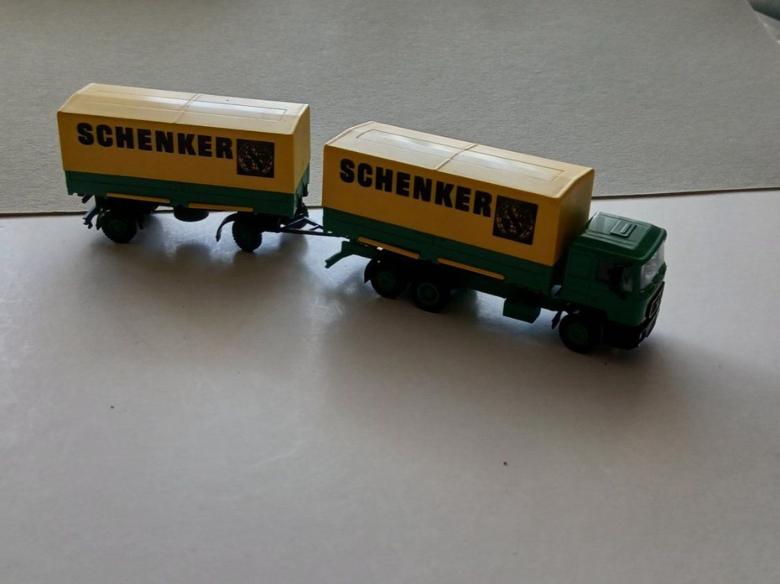 Herpa Modellini d'auto: Herpa MAN Büssing 3-a2-a WP Hängerzug Fa. Schenker – Nuovo e nell'imballaggio originale da Salgesch venduto da andiroues