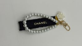 Schlüsselanhänger Perlen Band Schwarz Gold Logo Damen Neu