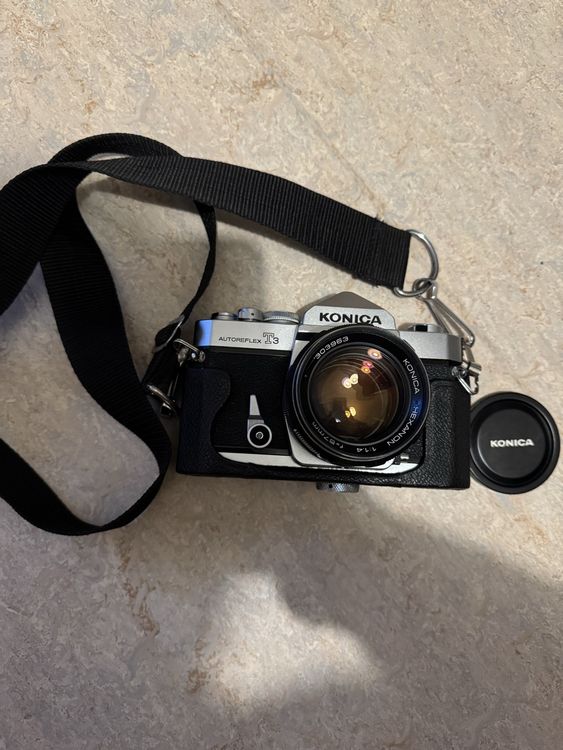 Konica Appareil photo: Konica Autoreflex T3 analog Kamera mit Hexanon 57mm 1.4 – D'occasion à Niederbipp par yar_tf6f