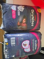 2 pqts Couches DryNites 4-7 ans