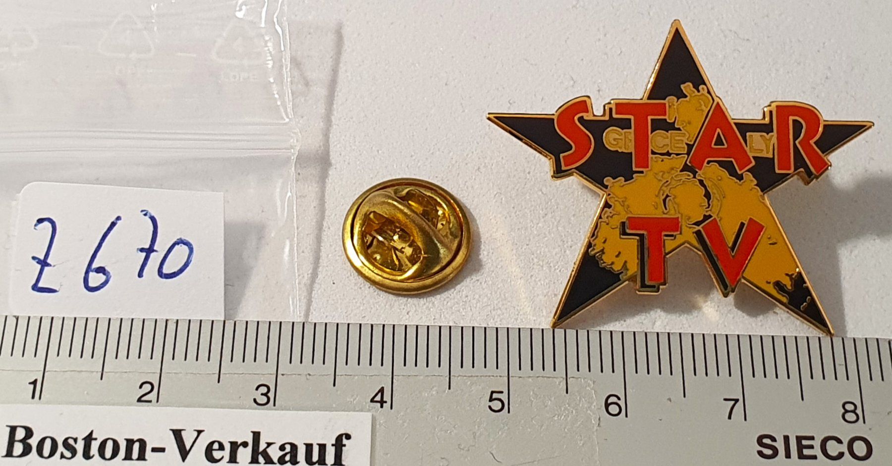 Plaketten & Abzeichen: Z670 - Pin STAR TV – Gebraucht aus Reinach BL von Boston-Verkauf 2