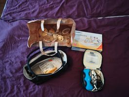 Medela Stillset mit Milchpumpe und Zubehoer gebraucht