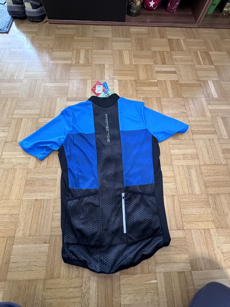 Canottiere & Pantaloni: Protective BikeT-short, bleu, M – Nuovo e nell'imballaggio originale da Neuchatel venduto da feta_ze 1