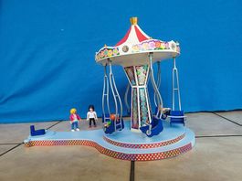 Playmobil - leuchtendes Karussell mit 4 Figuren