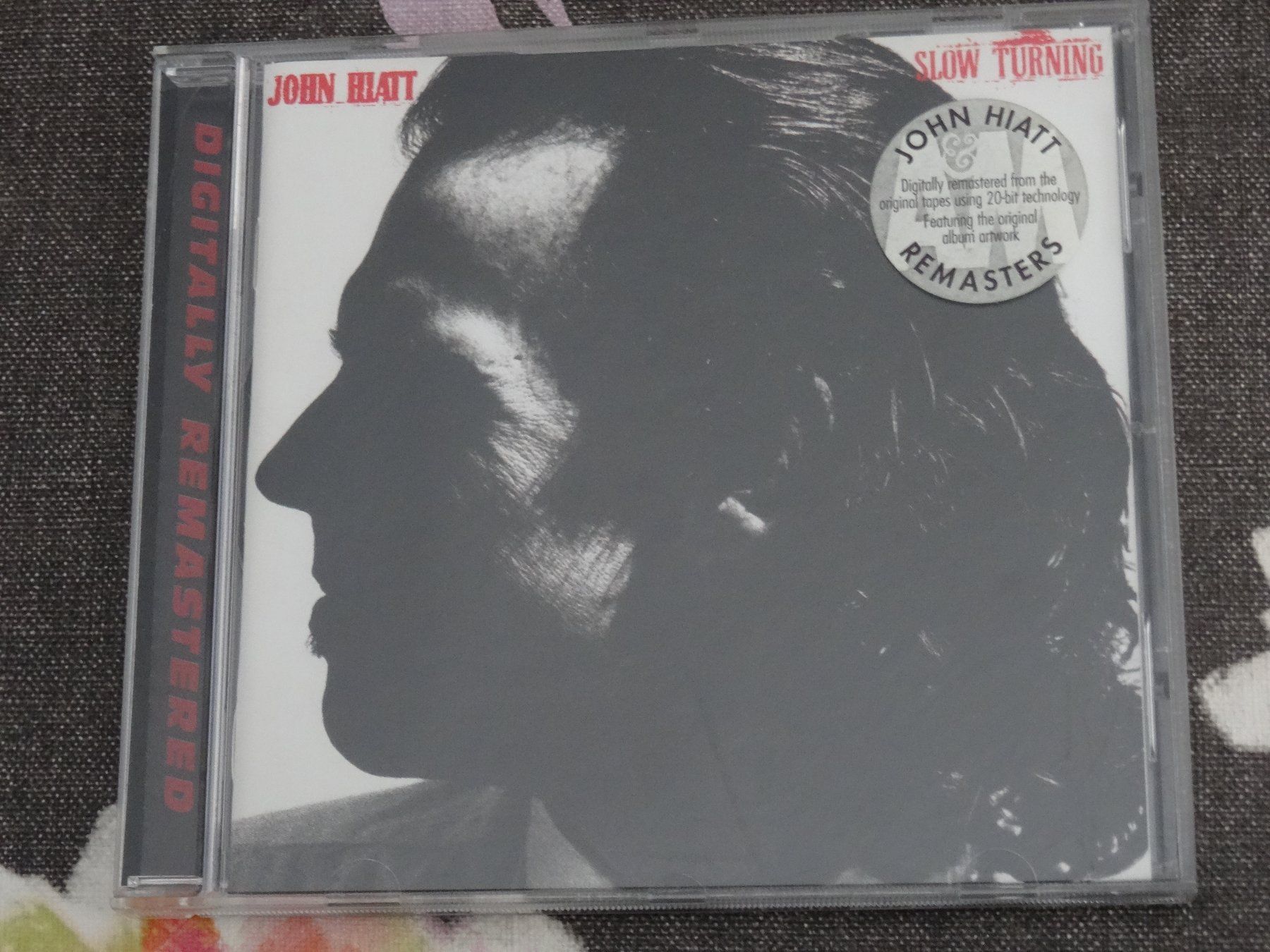 CDs: John Hiatt - Slow Turning CD – Gebraucht aus Olten von Disc-Ausverkauf