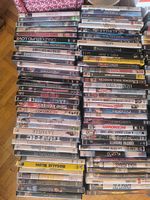 200 DVD environ, tout genres, certains neufs.
