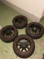 Sportfelgen mit rotem Rand + kaum gebrauchten Winterpneus