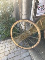3 alte Holzräder