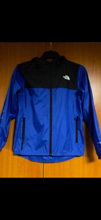 Veste The North Face, bleu et noir, taille enfant.