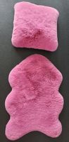 Fellteppich und Kissen pink / rosa