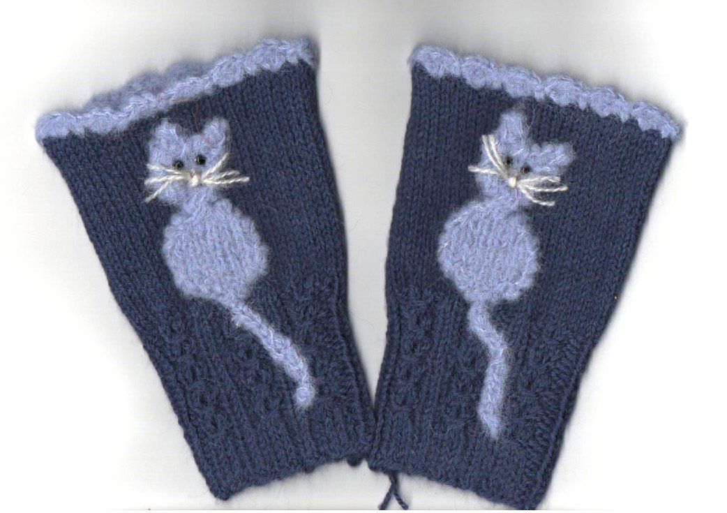 Guanti & manicotti: Pulswärmer mit Katze, handgestrickt – Nuovo (secondo la descrizione) da Kriens venduto da Kraeutergarten