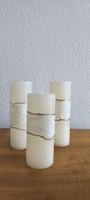 3 Raureifkerzen creme mit dekor. 