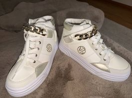 Stylische weiße Plateau Sneaker mit Gold-Details 