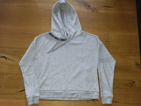 Sweat à capuche gris "Need More Space" taille M.